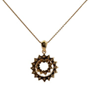 Openwork Diamond Swirl Pendant in Yellow Gold